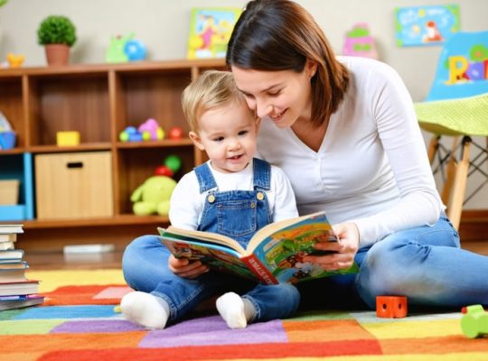 A nurturing scene of a parent reading a picture book to a young child on a carpet, surrounded by educational toys, capturing a moment of bonding and learning.